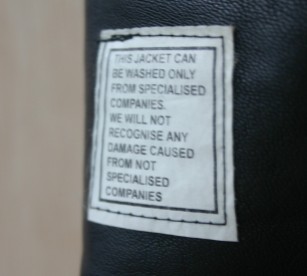 diy leather bag decorated with original care label
